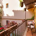 Roman House With Balcony